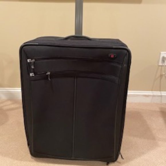 Tumi Handbags - Oversized Tumi travel bag